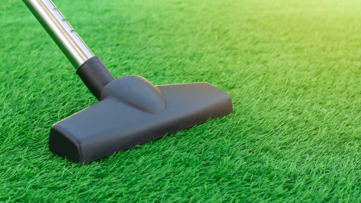after installation cleaning of artificial grass before handover to client